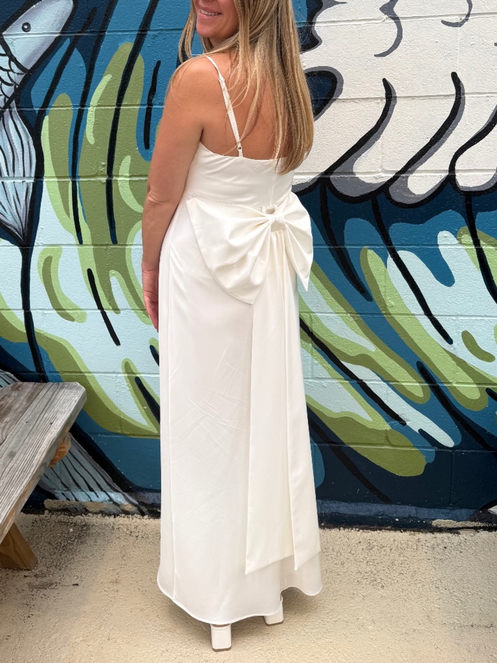 White satin dress with bow
